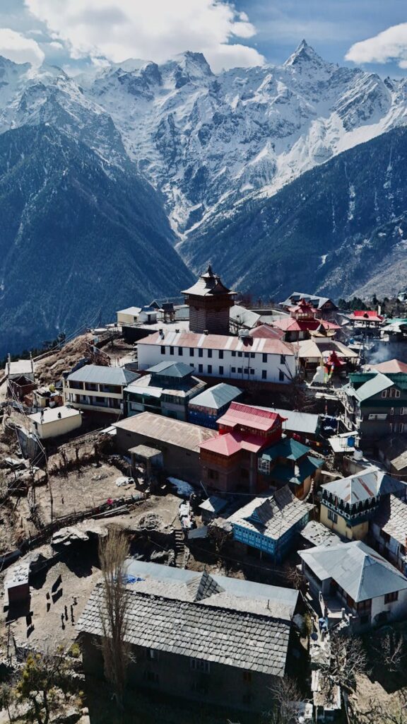 pexels-photo-20883700 A breathtaking aerial shot of Kalpa village in Himachal Pradesh, India, with snowcapped peaks of the Himalayas in the background.